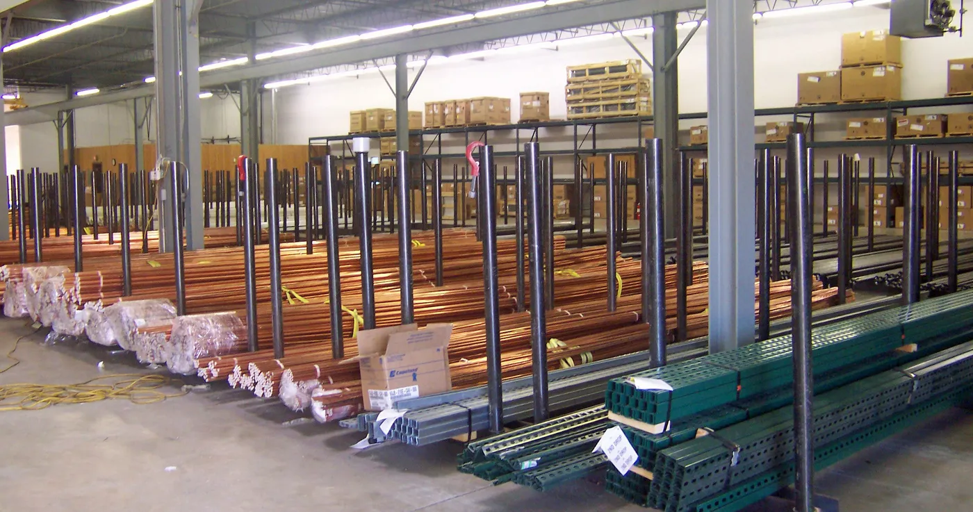 Copper tubing stocked on racks in an ILLCO warehouse
